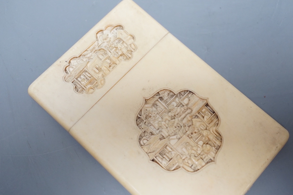 A 19th century Chinese Export ivory card case, 11.5 cms high x 7.5 cms wide.